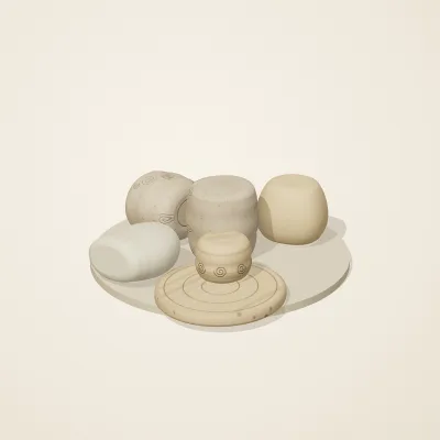 The six parts of Fossil Garden No. 2 in a loose pile on a round stand