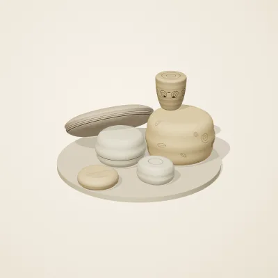 The six parts of Fossil Garden No. 3 in a loose pile on a round stand