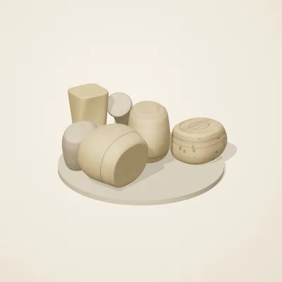The six parts of Fossil Garden No. 9 in a loose pile on a round stand