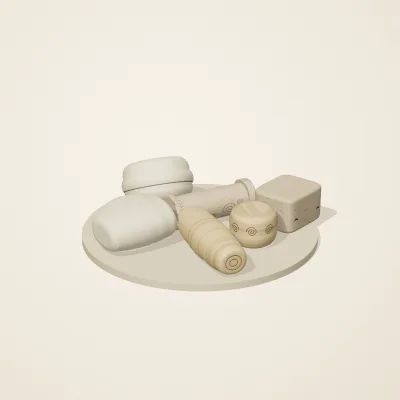 The six parts of Fossil Garden No. 14 in a loose pile on a round stand