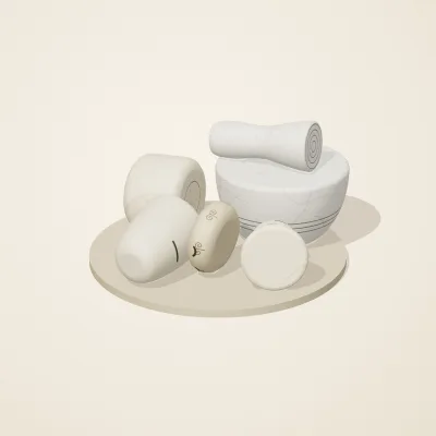 The six parts of Ivory Moon No. 5 in a loose pile on a round stand