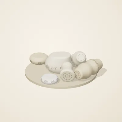 The six parts of Ivory Moon No. 7 in a loose pile on a round stand