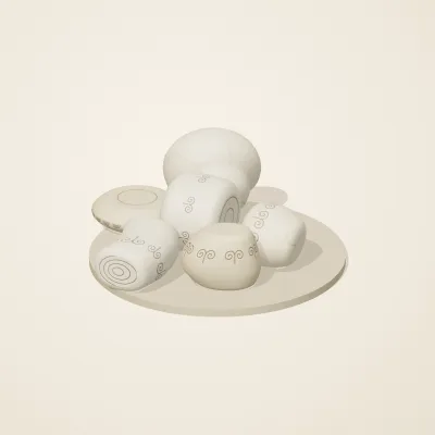 The six parts of Ivory Moon No. 11 in a loose pile on a round stand