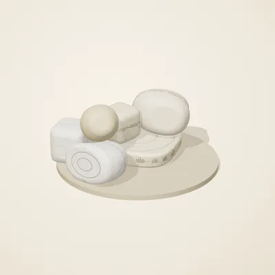 The six parts of Ivory Moon No. 12 in a loose pile on a round stand
