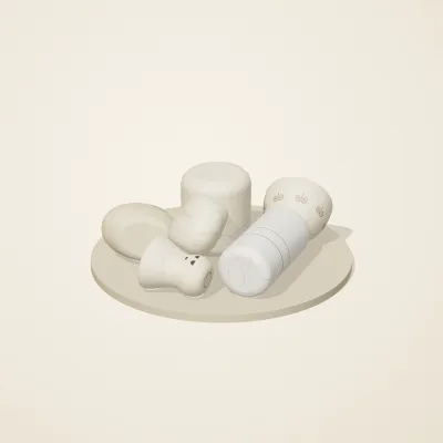 The six parts of Ivory Moon No. 15 in a loose pile on a round stand