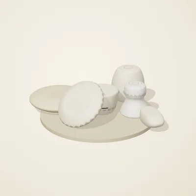 The six parts of Ivory Moon No. 18 in a loose pile on a round stand