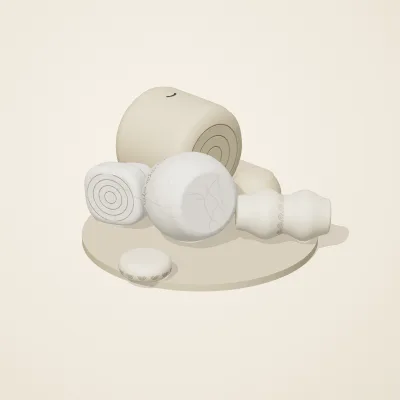 The six parts of Ivory Moon No. 20 in a loose pile on a round stand