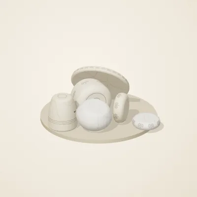 The six parts of Ivory Moon No. 21 in a loose pile on a round stand