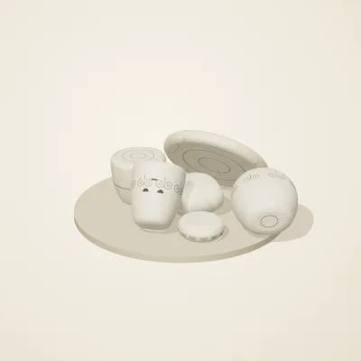 The six parts of Ivory Moon No. 25 in a loose pile on a round stand