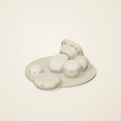 The six parts of Ivory Moon No. 32 in a loose pile on a round stand