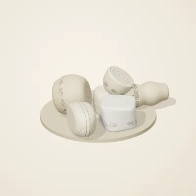 The six parts of Ivory Moon No. 34 in a loose pile on a round stand