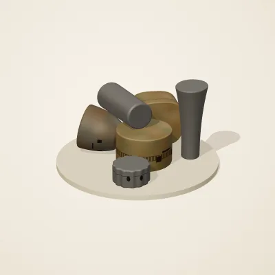 The six parts of Forgotten Machinery No. 1 in a loose pile on a round stand